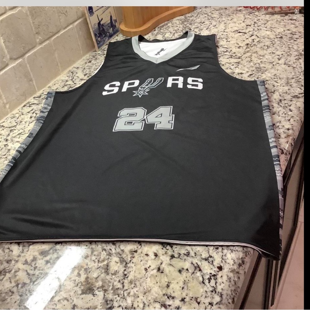 Super dope San Antonio Spurs reversible jersey #24.